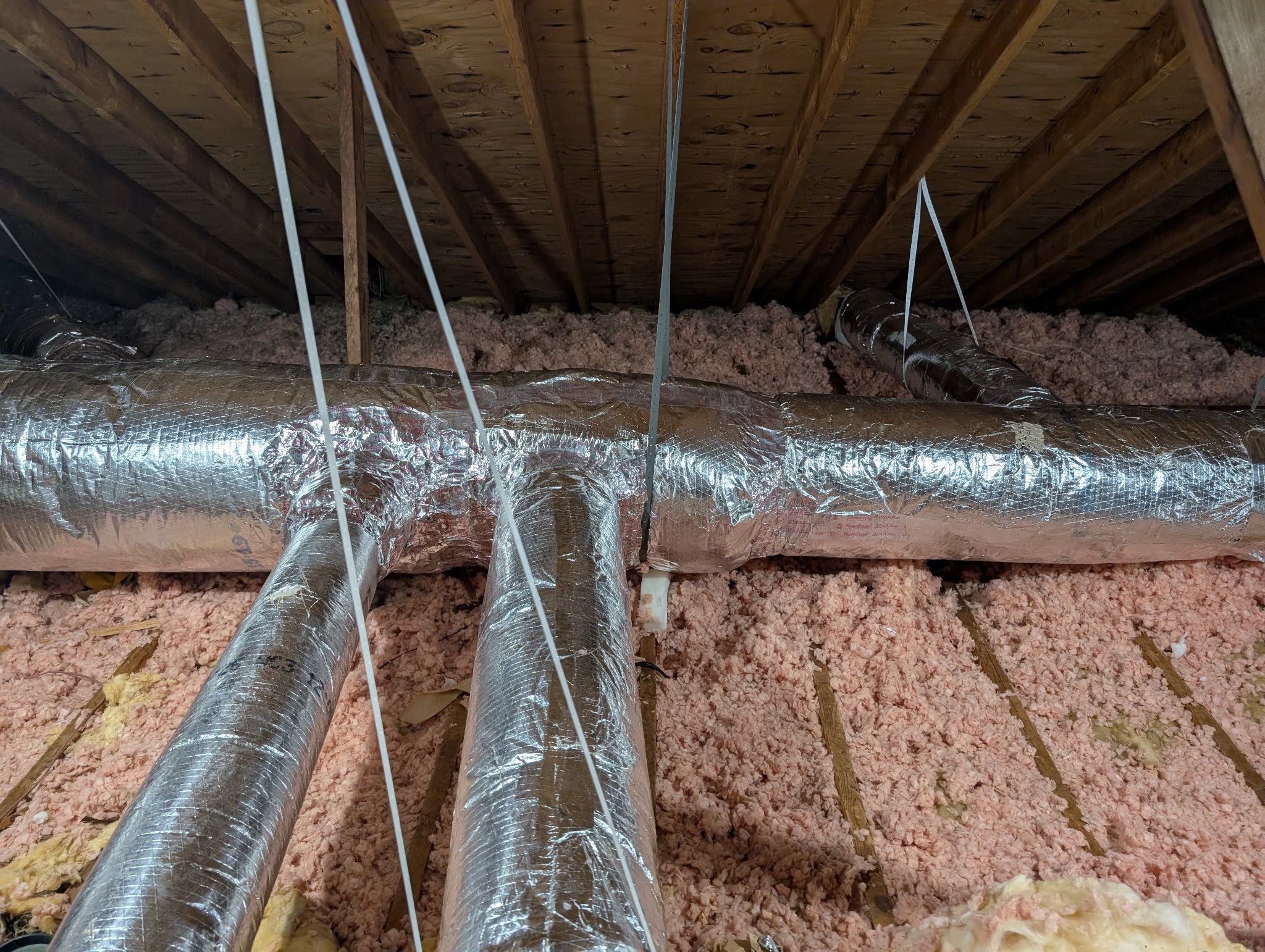 Insulated attic ductwork trunk and branch runs fabricated by J & L Heating & Cooling in Trenton, TN